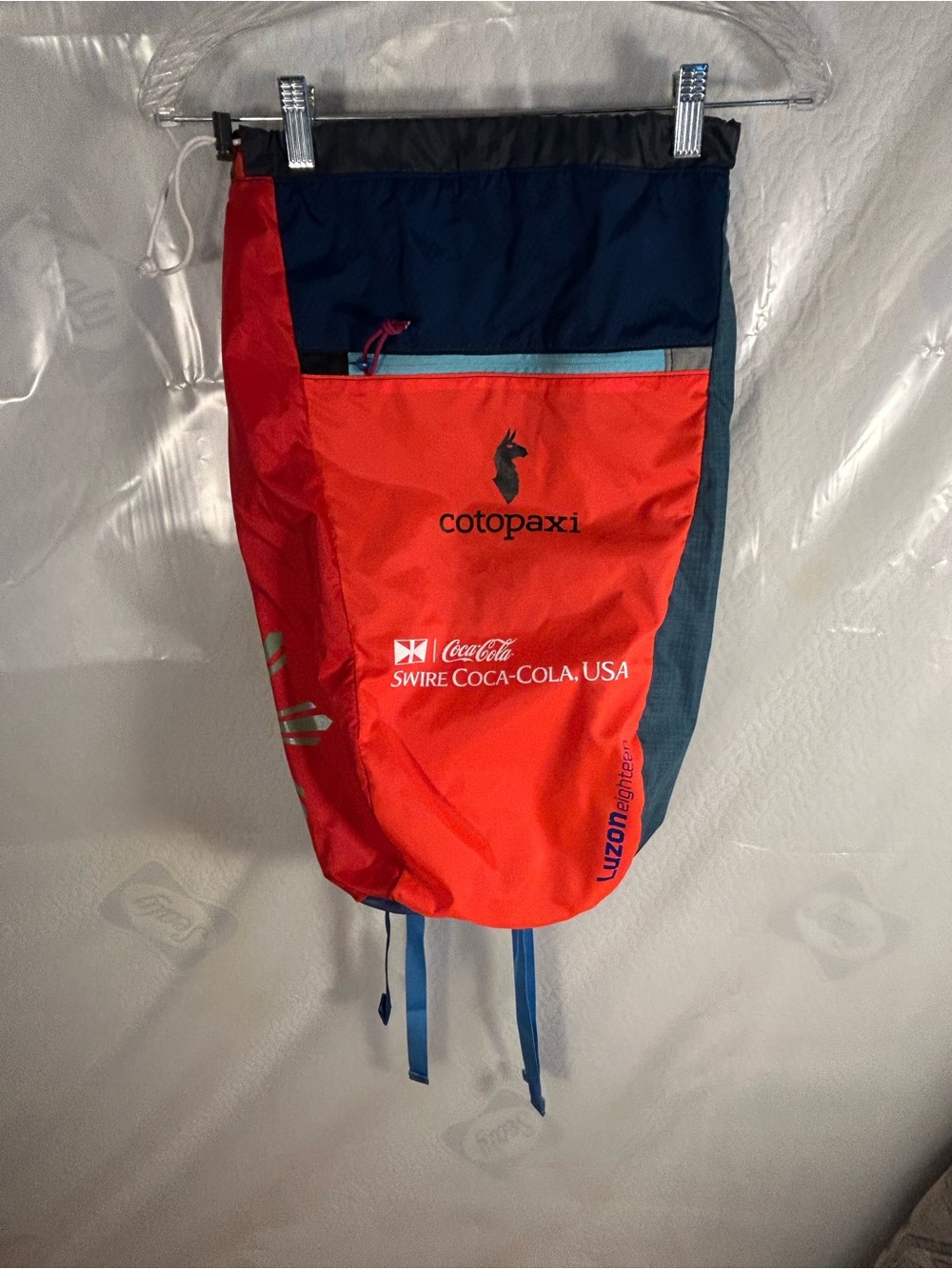 Cotopaxi Luzon 18L  backpack in Red and Navy Athletic Drawcord